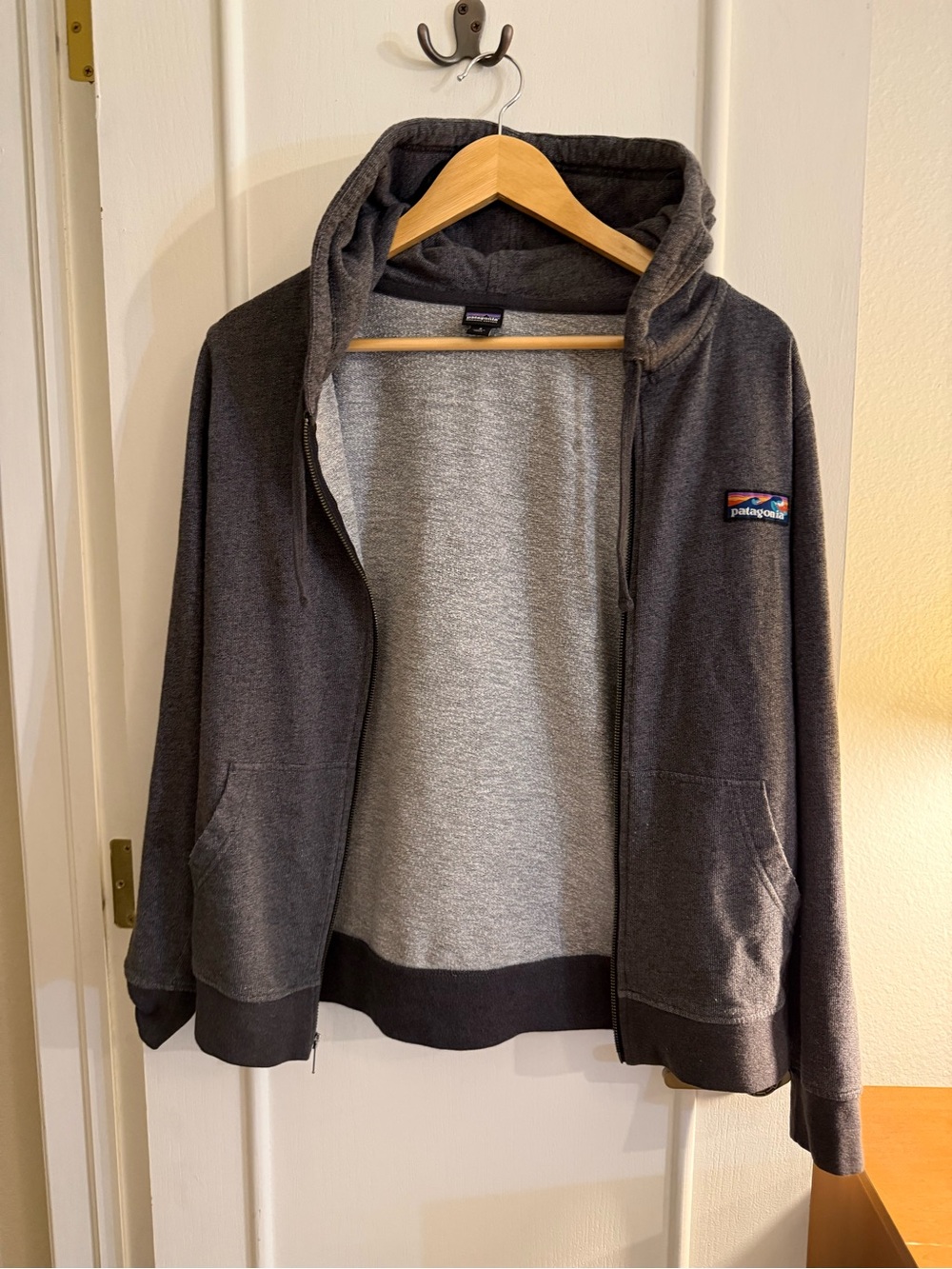 Patagonia Dark Gray Zip-Up Hoodie with Colorful Boardshort Logo